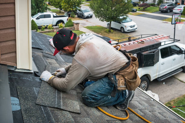 Professional Roofing technician working in Julian, NE